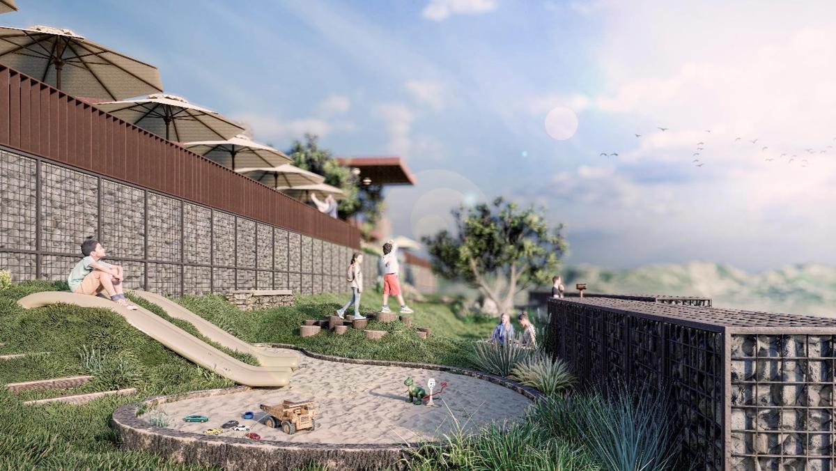 Área infantil de las amenidades NÓURA con vista al paisaje